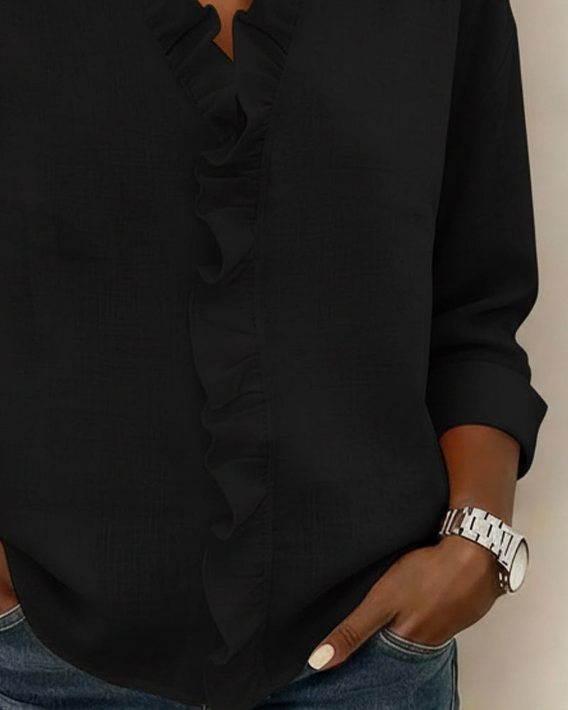 Velisse – Romantisk blus med eleganta volanger