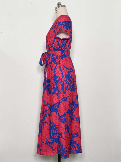 Nerina – midi klänning med omlott och prickar