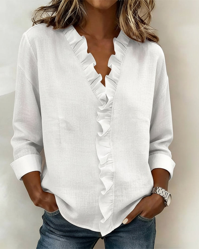 Velisse – Romantisk blus med eleganta volanger