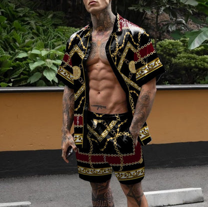 Ravio - Svart statement-sommarsätt med gyllene kedjeprint