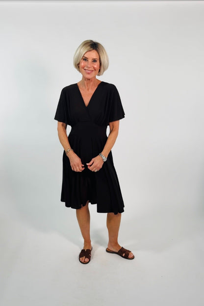 Signe – Elegant klänning med feminin och tidlös känsla