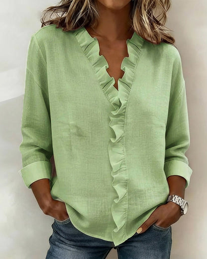 Velisse – Romantisk blus med eleganta volanger