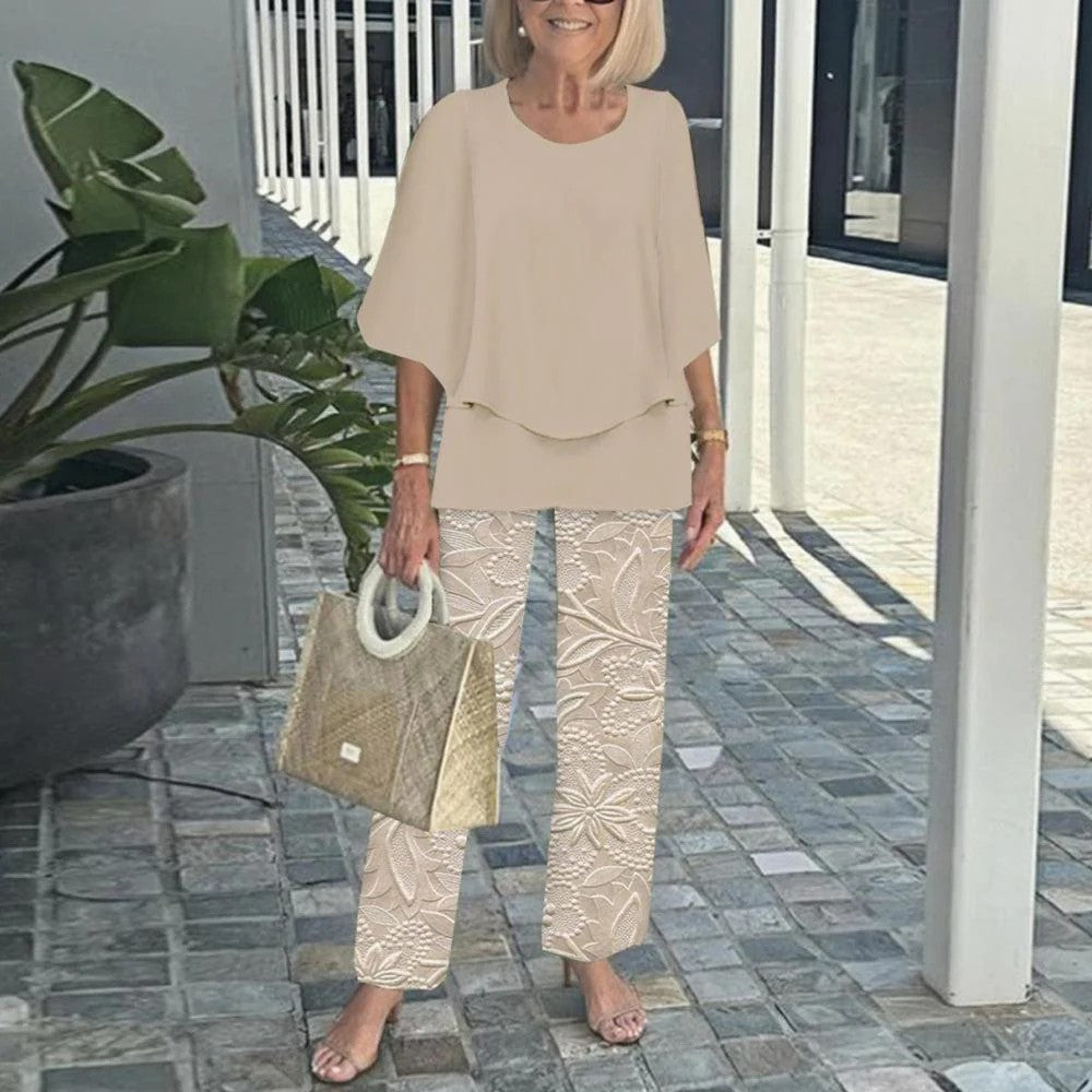 Ingrid – Elegant set med blus och mönstrade byxor