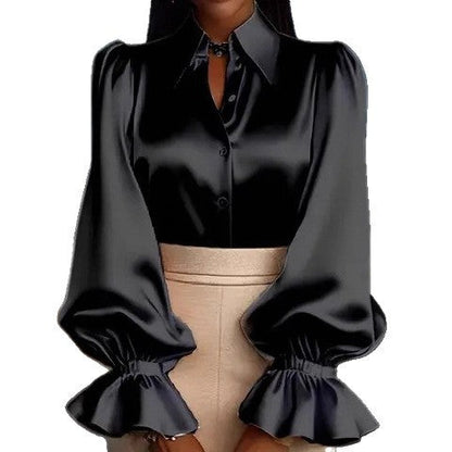 Nessa – Satinblus med statementärmar