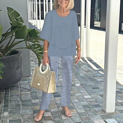 Ingrid – Elegant set med blus och mönstrade byxor