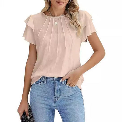 Phelia – Black top with playful flounce sleeves