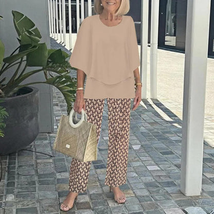 Ingrid – Elegant set med blus och mönstrade byxor