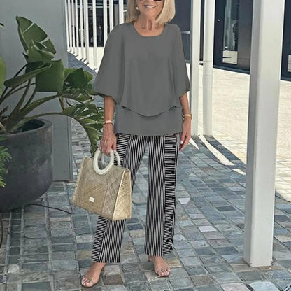 Ingrid – Elegant set med blus och mönstrade byxor