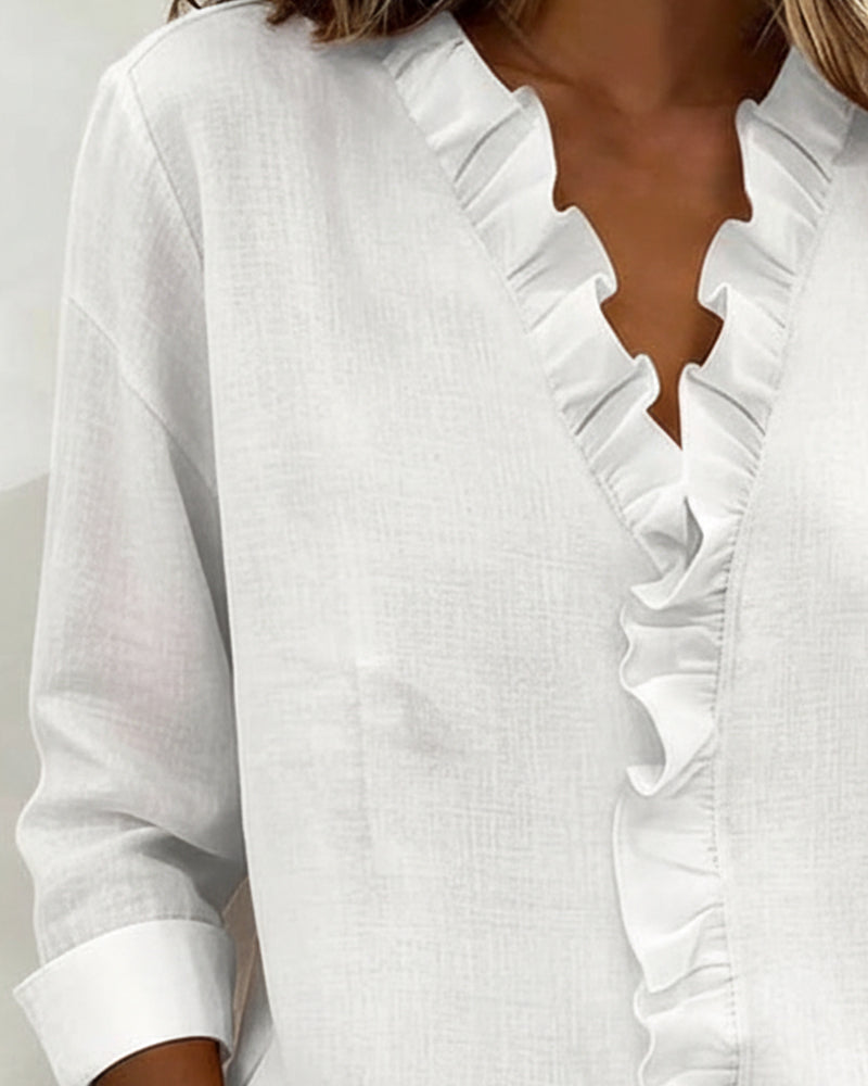 Velisse – Romantisk blus med eleganta volanger